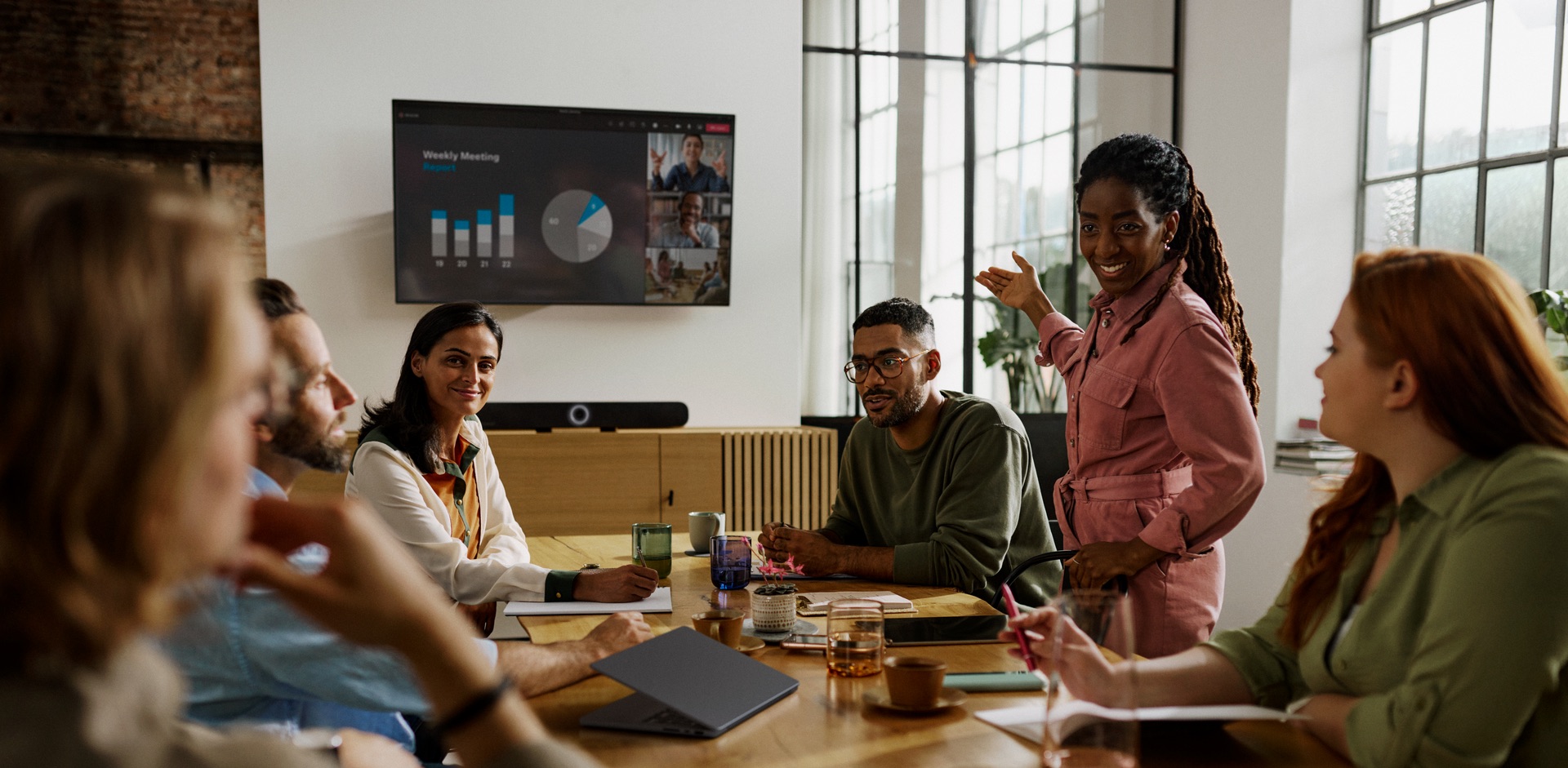 Professional team collaborating with Sennheiser audio solutions