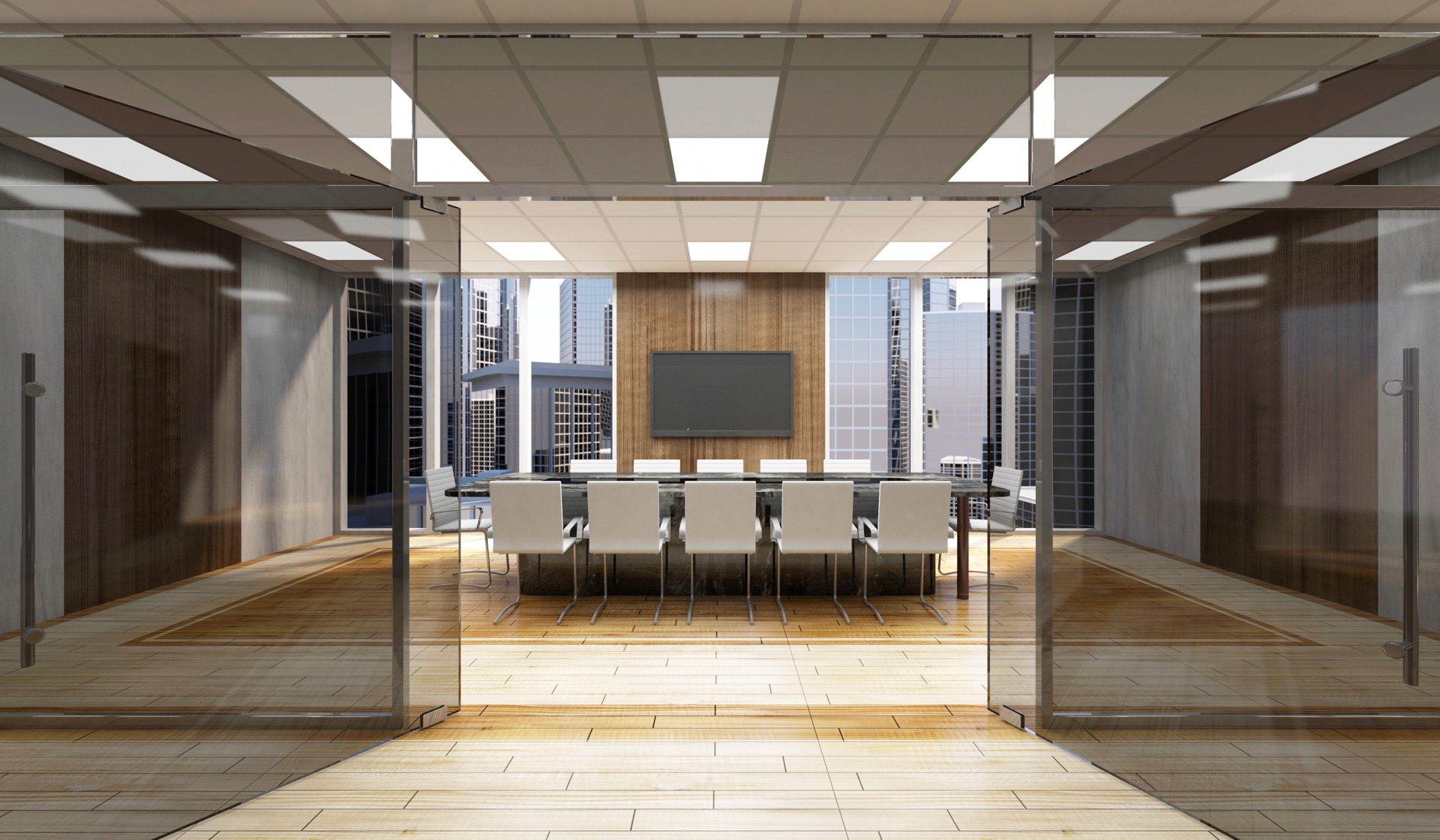 Boardroom through glass doors with large display and conferencing setup