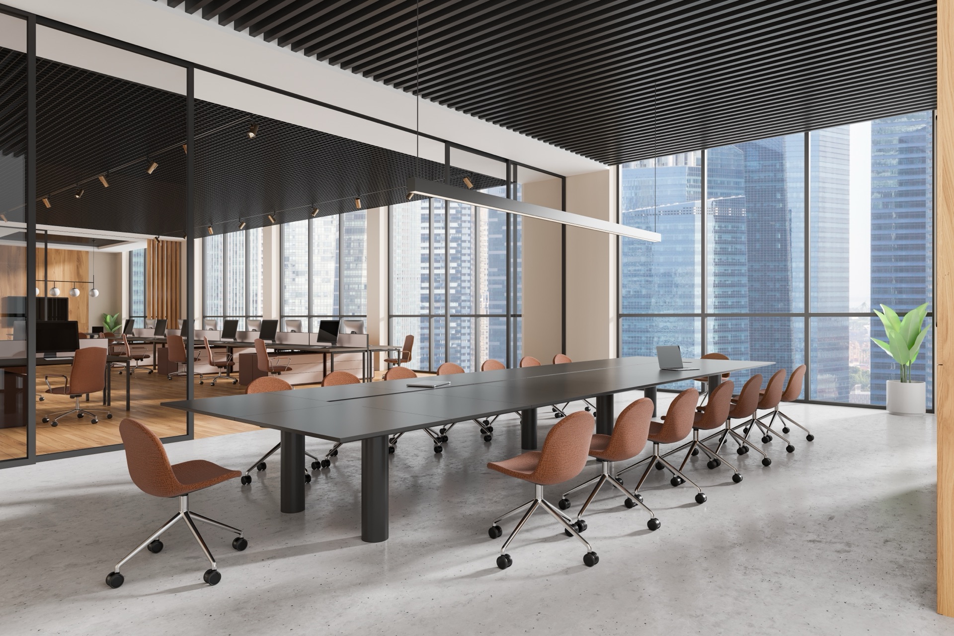Modern boardroom with conference table and ceiling-mounted audio technology