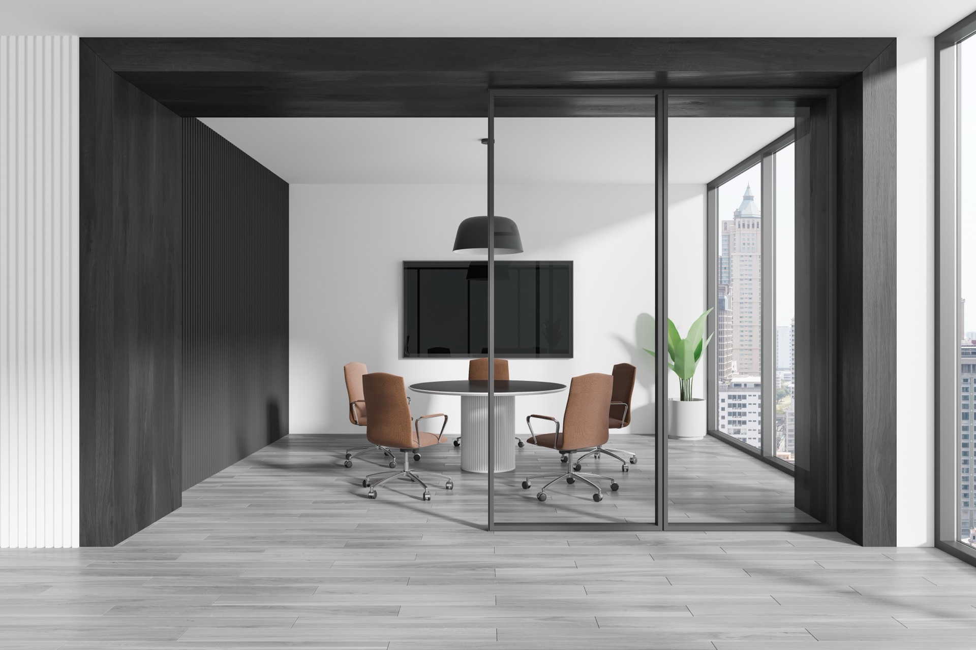 Huddle room with display and seating for video conferencing