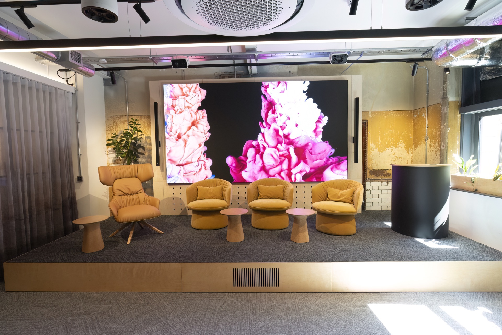 Habitech Pro Manchester Experience Centre with LED video wall and designer lounge seating